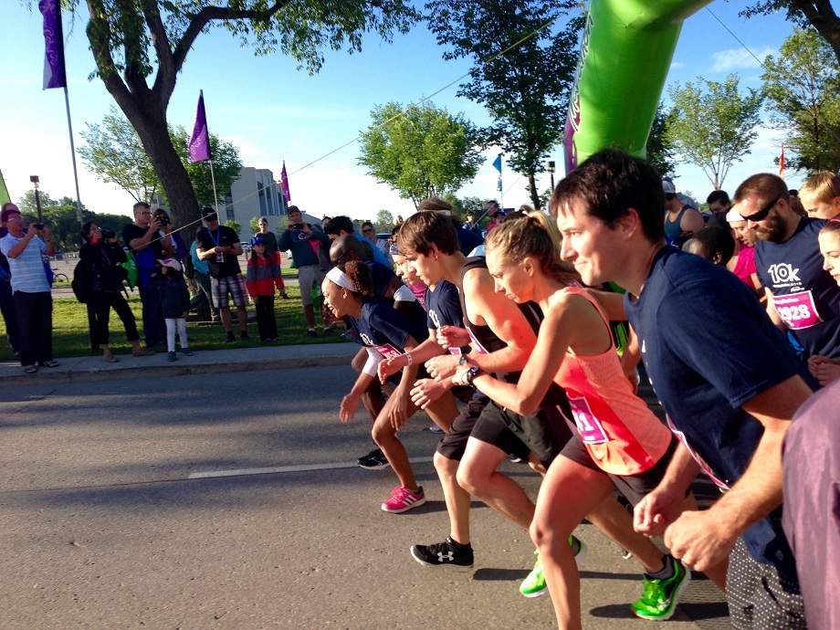 Runners take off from the start line Sunday morning at the Manitoba Marathon. 