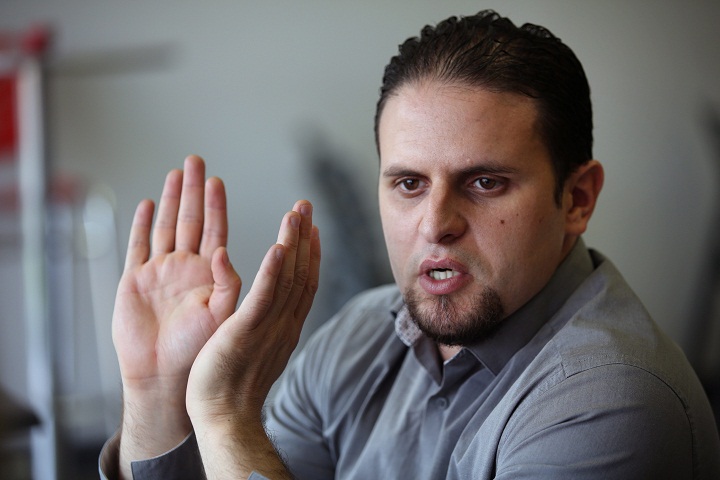 In this May 13, 2015 photo,  former Guantanamo detainee and al-Qaida trainee Mourad Benchellali talks during an interview with the Associated Press in Gennevilliers, suburban Paris,  France. 