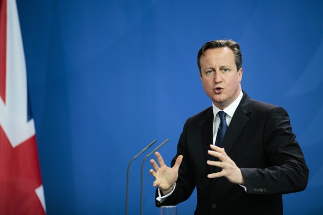 British Prime Minister David Cameron speaks to media in Berlin, Germany, Friday, May 29, 2015.