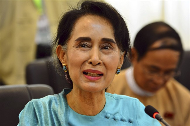 Myanmar's opposition leader Aung San Suu Kyi speaks during a press briefing at a parliament building Thursday, June 25, 2015, in Naypyitaw, Myanmar. Myanmar's parliament voted against constitutional amendments that day, ensuring that the military's veto power remains intact and that Suu Kyi cannot become president in an election this year.