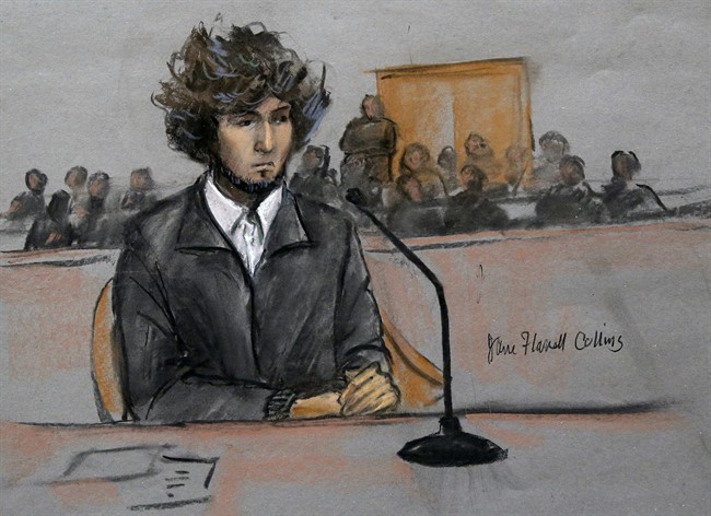 In this Dec. 18, 2014 courtroom sketch, Boston Marathon bomber Dzhokhar Tsarnaev sits in federal court in Boston. 