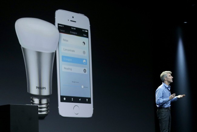 Apple senior vice president of Software Engineering Craig Federighi speaks about the Apple HomeKit app at the Apple Worldwide Developers Conference in San Francisco. The first “smart” home gadgets that can be controlled by Apple’s voice-activated digital assistant are going on sale this week, just days after rival tech giant Google announced its own software for Internet-connected home appliances and other gadgets.