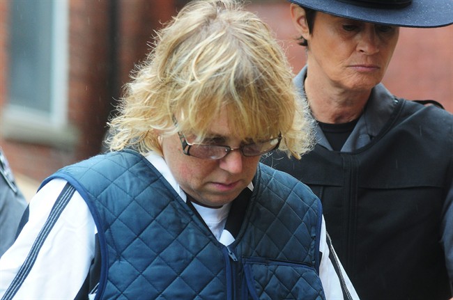 Joyce Mitchell heads into Plattsburgh City Court for her hearing, Monday, June 15, 2015, in Plattsburgh, N.Y. 