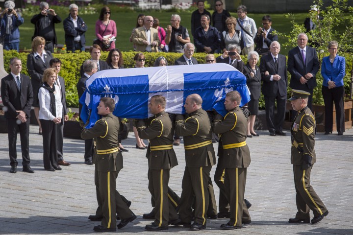 The casket of former Quebec premier Jacques Parizeau arrives before lying in state at the National Assembly in Quebec City on Sunday, June 7, 2015.