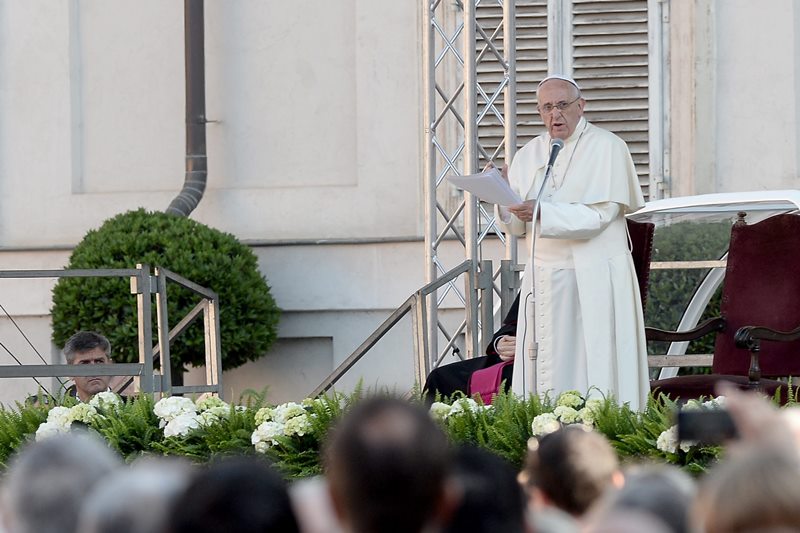 Pope Francis Pope Francis delivers his speech during as he meets with workers and businessmen during his visit to Turin, northern Italy, Sunday, June 21, 2015. Pope Francis earlier prayed in front of the Holy Shroud, the 14 foot-long linen revered by some as the burial cloth of Jesus, on display at the Cathedral of Turin. 