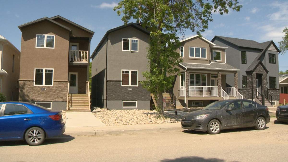 In this Regina neighbourhood, there are four homes on what used to be two lots. Two of the new houses are up-and-down suites, which intensifies the number of people in the neighbourhood.