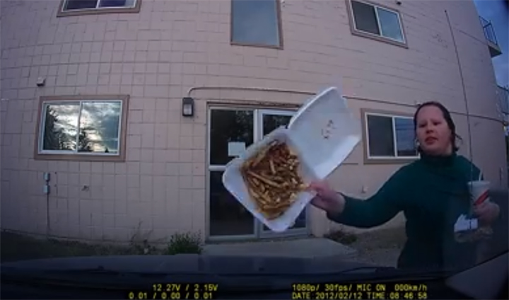 A video posted on Daryl Siba’s Facebook page said his motion-activated dashboard camera caught a lady dumping her poutine on his truck and then calmly waking away.
