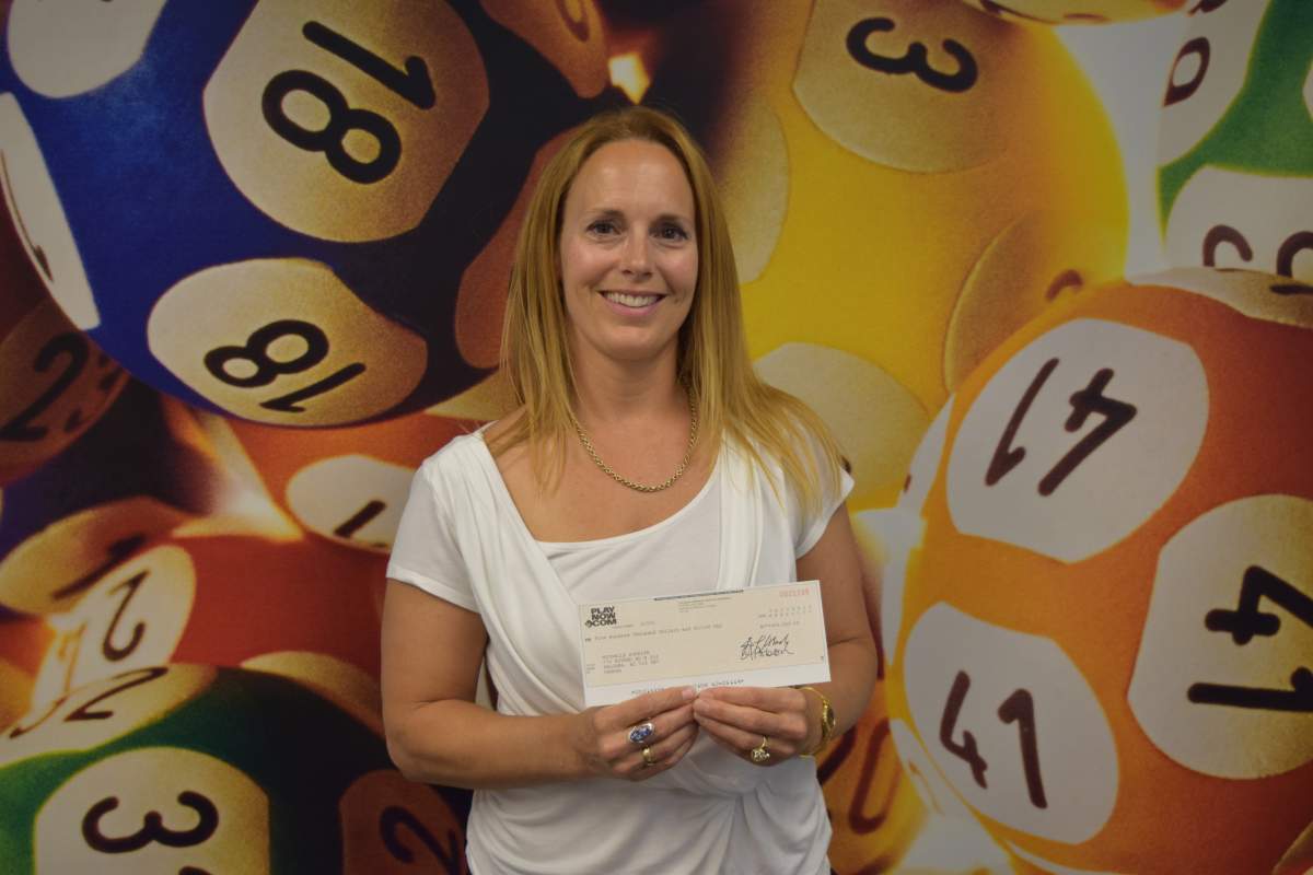 Kelowna resident cashes in with half-million dollar lotto win - image