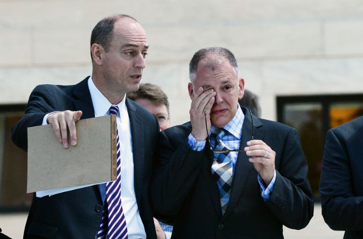 Plaintiff James Obergefell (R) in the Obergefell v. Hodges case gets emotional outside the US Supreme Court on April 28, 2015 in Washington, DC. The Supreme Court meets to hear arguments whether same-sex couples have a constitutional right to wed in the United States.
