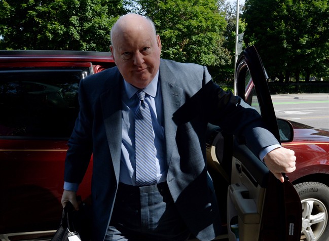 Suspended Senator Mike Duffy arrives at court in Ottawa on Thursday, June 4, 2015. 