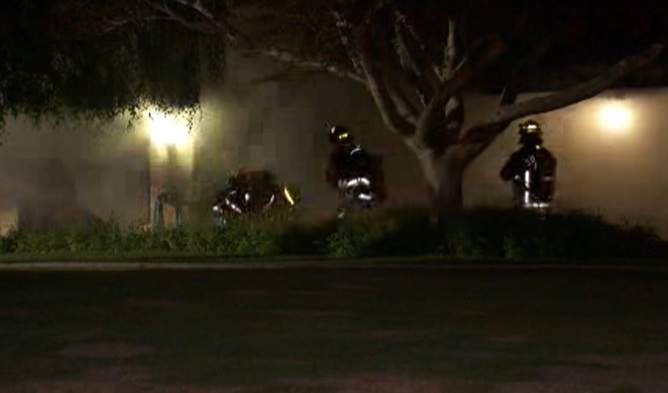 Fire crews tackle early morning house fire in Surrey - image