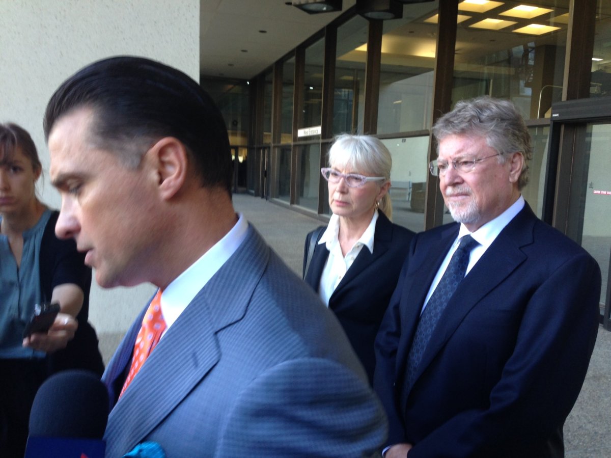 Richard Suter outside the Edmonton courthouse with his lawyer. June 5, 2015.