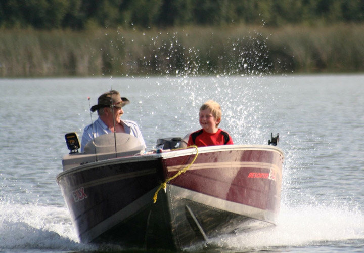 This is a picture of my dad & son doing what they do best, going fishing.  Seeing the both of them smiling melts my heart.  