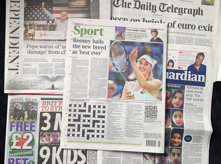 A combo taken on Wednesday June 17, 2015 showing some of the British national newspapers of Tuesday June 16 and featuring at centre the back page of The Times showing its daily crossword puzzle. 