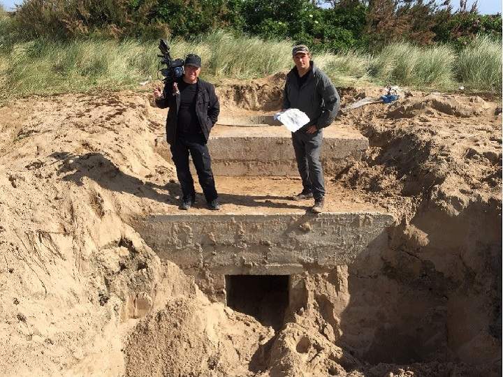 Wayne Abbott and David O’Keefe of History’s ‘War Junk’ uncovered a German maching gun postion, known as a Tobruk, on Juno Beach just ahead of the 71st anniversary of D-Day.