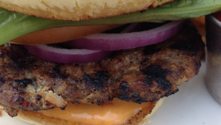 Kevin takes his search for #yxeBestBurger the patio of the Freehouse.