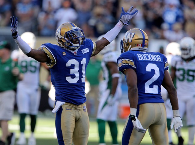 Winnipeg Blue Bombers' Maurice Leggett (31) and Matt Bucknor (2) celebrate a fumble recovery last season. Leggett will be back in the lineup for Thursday's home-opener against the Hamilton Tiger-Cats.
