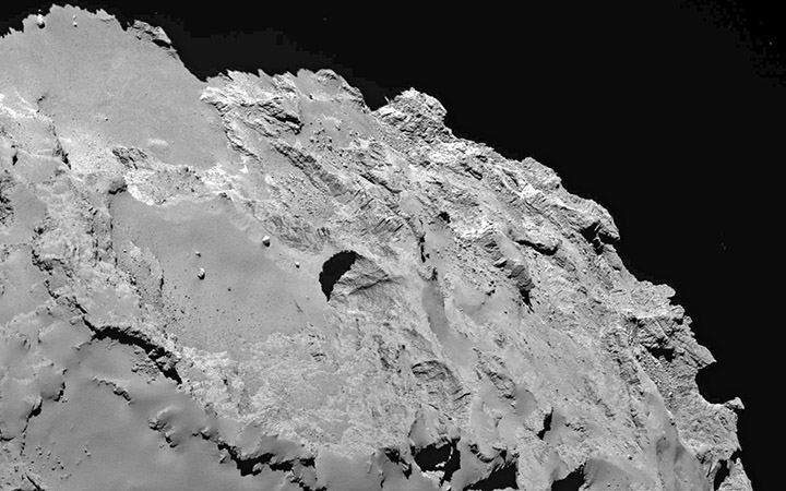 This photo made by the European Space Agency's Rosetta spacecraft and provided by researchers led by Jean-Baptiste Vincent shows the most active pit, known as Seth_01, which scientists believe is one of several sinkholes on the comet 67P/Churyumov-Gerasimenko.