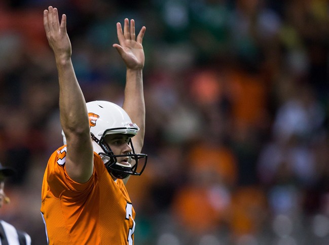 B.C. Lions' kicker Richie Leone celebrates his 56-yard game-tying field goal that forced overtime during the second half of a CFL football game against the Saskatchewan Roughriders in Vancouver, B.C., on Friday July 10, 2015.