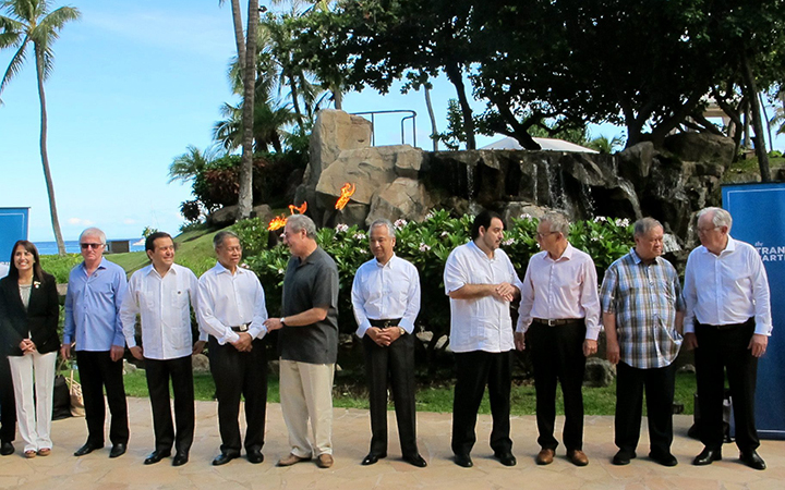 Trade ministers from 12 Pacific Rim nations negotiating the Trans-Pacific Partnership agreement pose for a group photo at a meeting in Lahaina, Hawaii on Thursday, July 30, 2015.