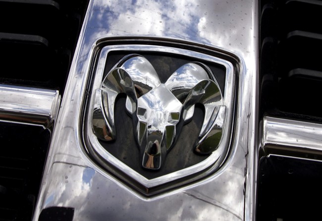 FILE - This July 13, 2011, file photo shows the Ram logo on a Ram pickup truck at a dealership in Hillsboro, Ore.
