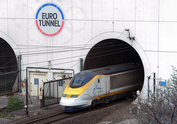 A Eurostar train comes out of the Channel Tunnel, owned by EuroTunnel, on April 10, 2014 in Coquelles, northern France. 