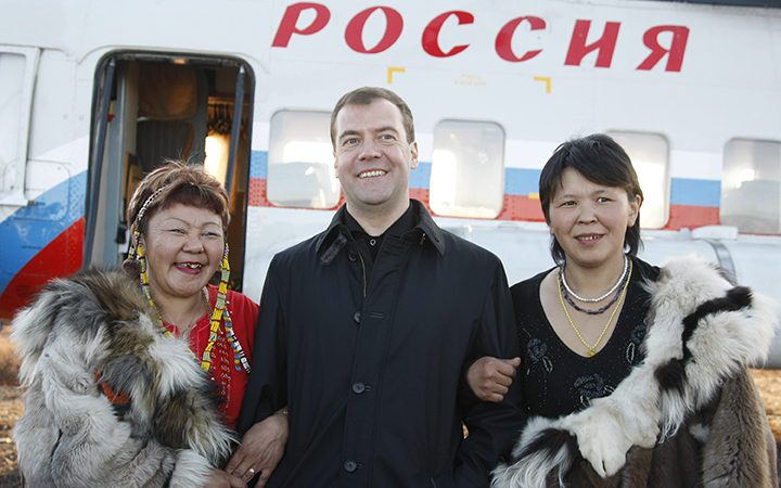 Prime Minister of Russia Dmitry Medvedev poses with Chukotka natives in the village of Kanchalan, Russia.