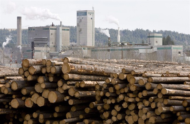 FILE -- Logs are piled up at West Fraser Timber in Quesnel, B.C., Tuesday, April 21, 2009. 