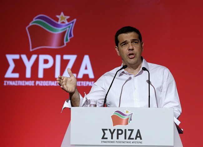 Greek Prime Minister Alexis Tsipras addresses a meeting of his ruling radical left Syriza party's central committee in Athens, on Thursday, July 30, 2015. Tsipras called for an extraordinary party congress in September, after Greece is expected to seal a new bailout deal with its international creditors, in a bid to end a rebellion by his hardline lawmakers that is threatening to topple his coalition government. (AP Photo/Thanassis Stavrakis).