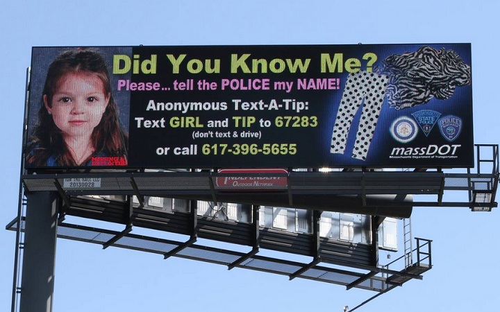A billboard officials hope will help identify a young girl who was found dead last month near Boston.