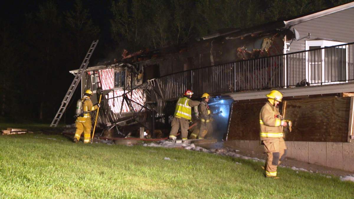 Emergency crews respond to a fire near Balzac on Township Road 262A on Friday, July 31, 2015.