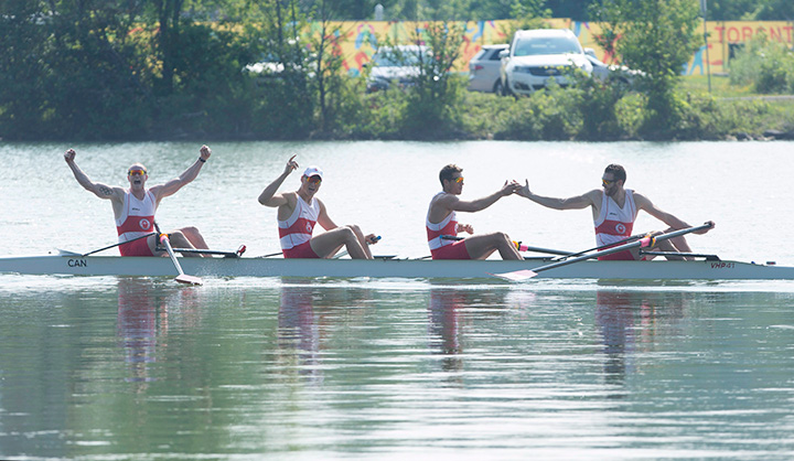 Canadians (left to right)Will Crothers, Tim Schrijver, Kai Langerfeld, and Conlin McCabe celebrate after winning gold in the men's coxless 4 final at the 2015 Pan Am Games at the Royal Canadian Henley Rowing Course in St. Catharines, Ont., Monday, July 13, 2015. 