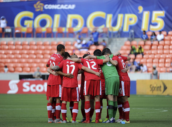 Team Canada players huddle before their CONCACAF Gold Cup soccer match against Jamaica, Saturday, July 11, 2015, in Houston.