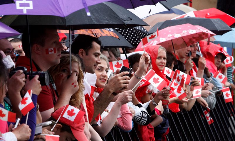 People celebrate Canada Day on Parliament Hill in Ottawa, Wednesday July 1, 2015.