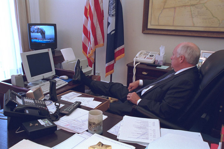 Former Vice-President Dick Cheney watches news reports of the attacks on the World Trade Center from his office.
