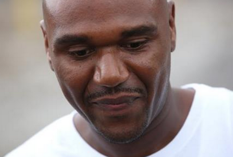 In this Aug. 31, 2012 photo, Alprentiss Nash, who was been behind bars since his murder conviction in 1995, walks free from the Menard Correctional Center in downstate Chester, Ill., after Cook County prosecutors dropped the case against him. Chicago Police said Wednesday, July 29, 2015, that Nash was fatally shot in Chicago, Tuesday, July 28 after after an argument during "some sort of transaction" between Nash and his attacker. 