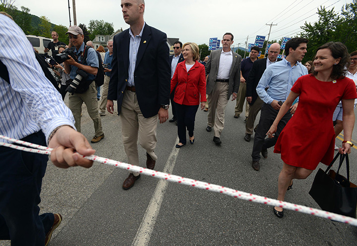 Democratic presidential candidate Hillary Clinton marches in the Gorham Fourth of July parade July 4, 2015 in Gorham, New Hampshire. 