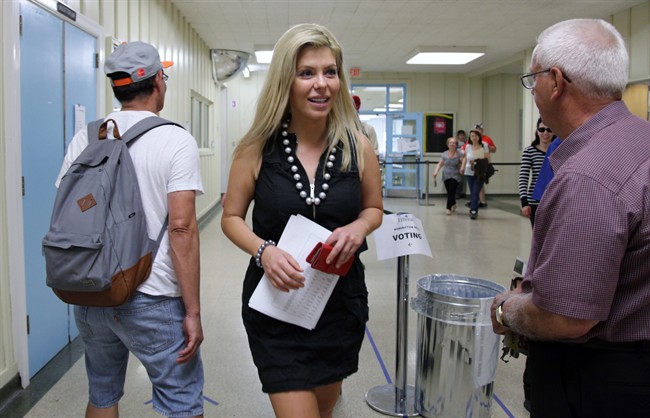 Liberal MP Eve Adams is seen as party members in the Toronto riding of Eglinton-Lawrence vote for their election candidate on Sunday, July 26, 2015. Adams, who defected from the Tories, is up against lawyer Marco Mendicino. 