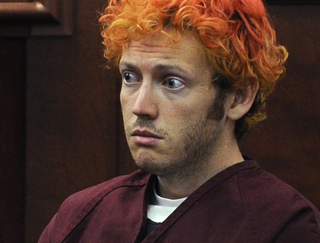 In this July 23, 2012, file photo, James Holmes, who is charged with killing 12 moviegoers and wounding 70 more in a shooting spree in a crowded theatre in 2012, sits in Arapahoe County District Court in Centennial, Colo.