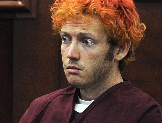 In this July 23, 2012 file photo, James Holmes, who killed 12 moviegoers and wounded 70 more in a shooting spree in a crowded theatre in 2012, sits in Arapahoe County District Court in Centennial, Colo.