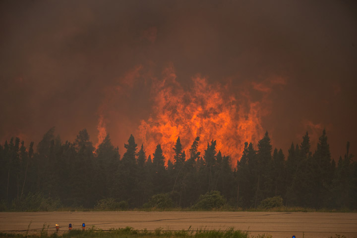 A University of Saskatchewan professor calls for wildfire strategy, says climate change will create larger, more intense fires.