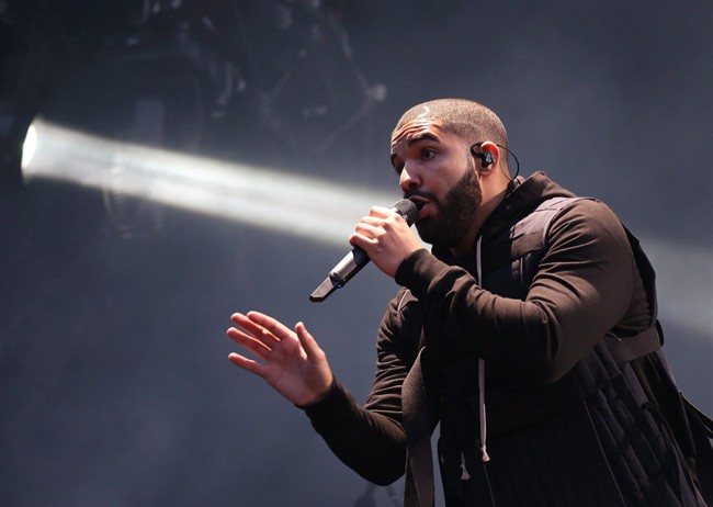 Canadian singer Drake performs on the main stage at Wireless festival in Finsbury Park, London, Friday, July 3, 2015. 