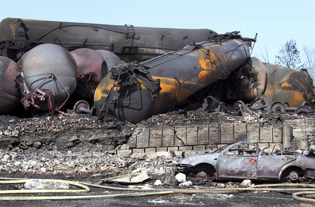 Wrecked oil tankers and debris from a runaway train in Lac-Megantic, Que. are pictured July 8, 2013.