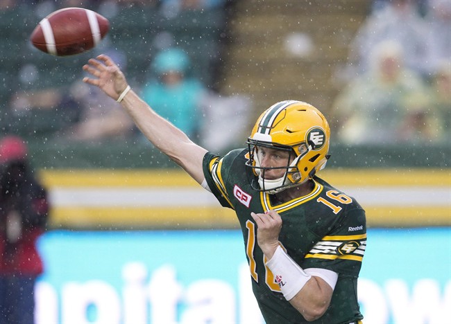 Edmonton Eskimos quarterback Matt Nichols (16) passes against the Winnipeg Blue Bombers during first half CFL action in Edmonton, Alta., on Saturday July 25, 2015. 