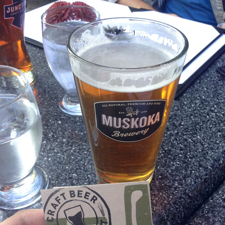 A pint of Muskoka Detour, pictured at Morgans on the Danforth – July 2015. Muskoka Detour is a craft beer that takes a “left turn from a normal IPA.”