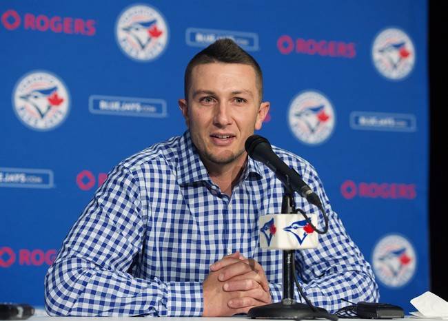 Toronto Blue Jays' newly-acquired shortstop Troy Tulowitzki speaks to reporters during a press conference in Toronto on Wednesday, July 29, 2015.