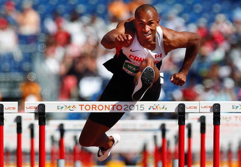 Damian Warner of Canada in the 110m hurdles in the men's decathlon during the athletics at the Pan Am Games in Toronto, Thursday July 23, 2015. 