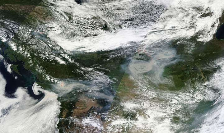 Smoke is seen drifting over B.C., Alberta and Saskatchewan on July 6.