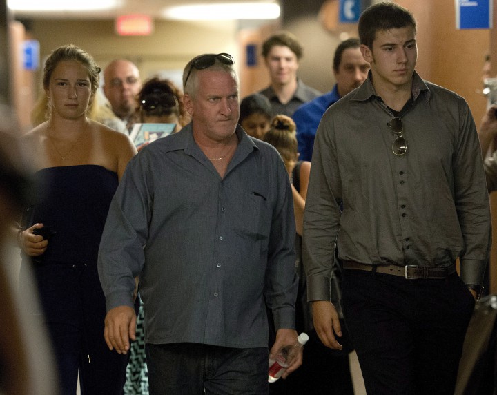 The family of Samantha Higgins leaves the courtroom after Nicholas Fontanelli was charged with first-degree murder of his fiancee, Samantha Higgins, Tuesday, July 14, 2015 in Montreal.