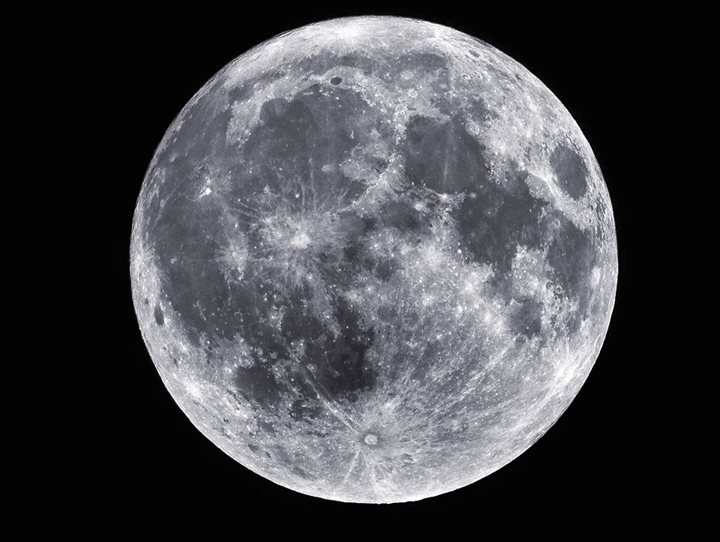This is what a blue moon looks like. Can you tell the difference between it and a "regular" full moon?.